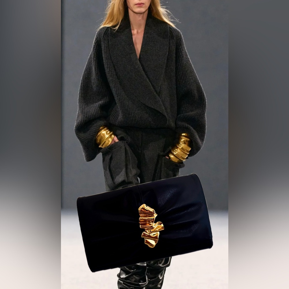 Italian leather clutch with Gold Ripple hardware with detachable long chain.